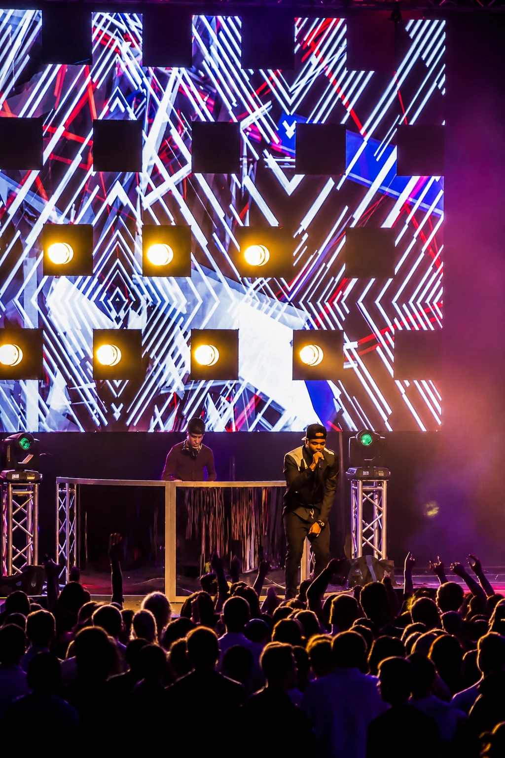 Concert-style stage lighting rig with beams and backlight at a Washington, DC event by EventPro