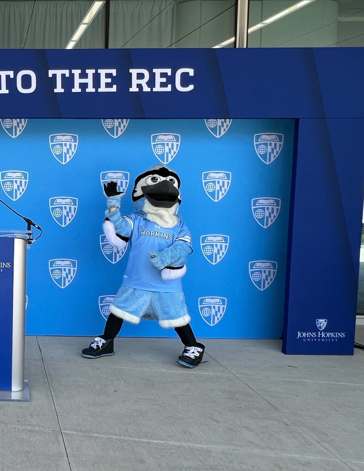 Johns Hopkins mascot at the EventPro branded podium, Follow Me to the Rec grand opening, Ralph S. O'Connor Recreation Center Baltimore