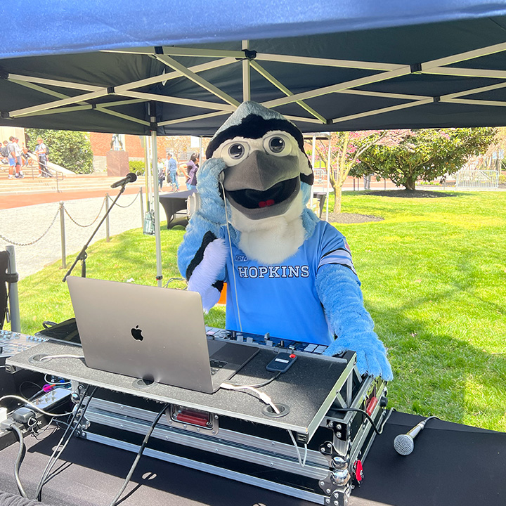 Johns Hopkins mascot DJing the outdoor block party, Follow Me to the Rec entertainment, EventPro production