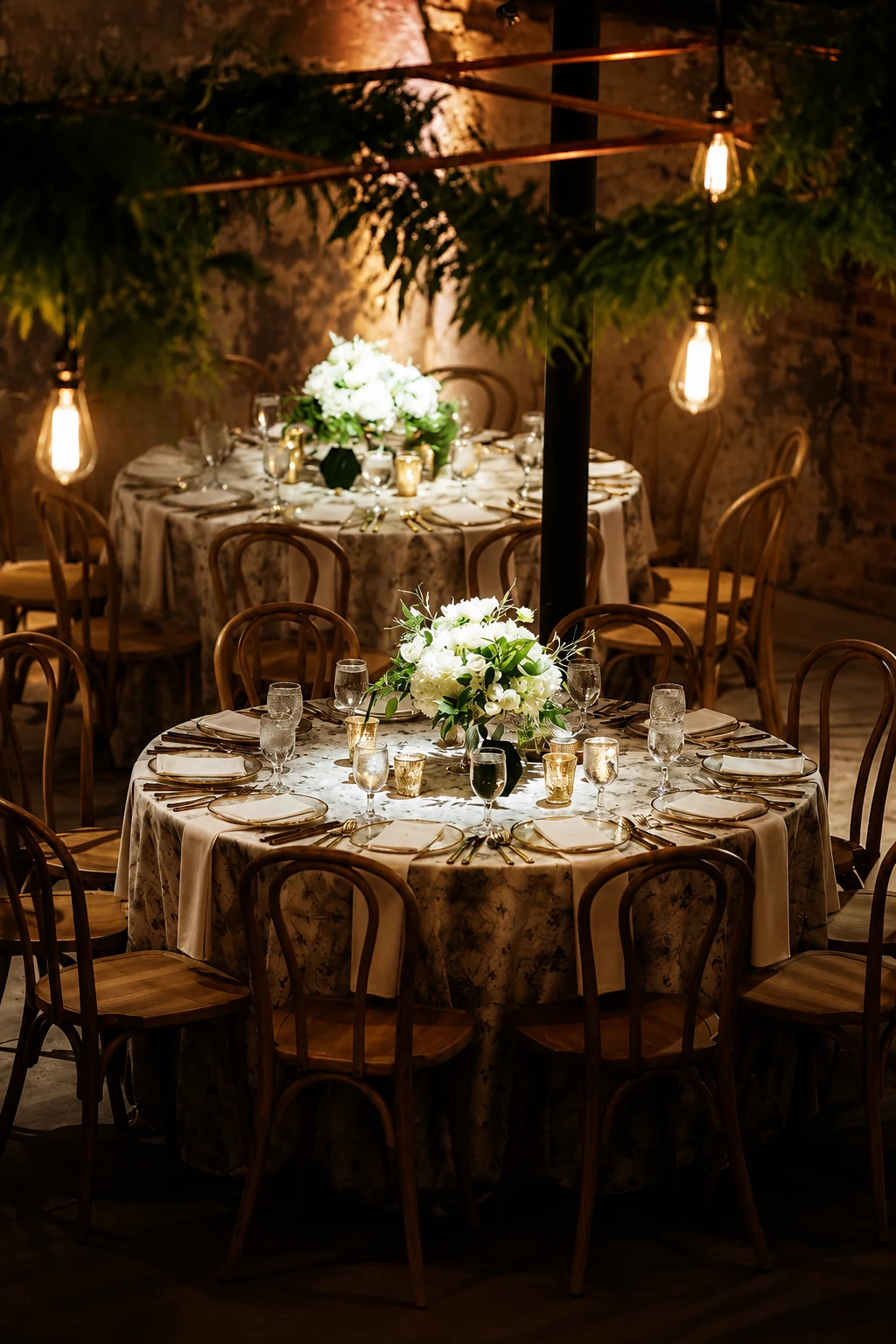 Pin spots lighting centerpieces at a Washington, DC event by EventPro
