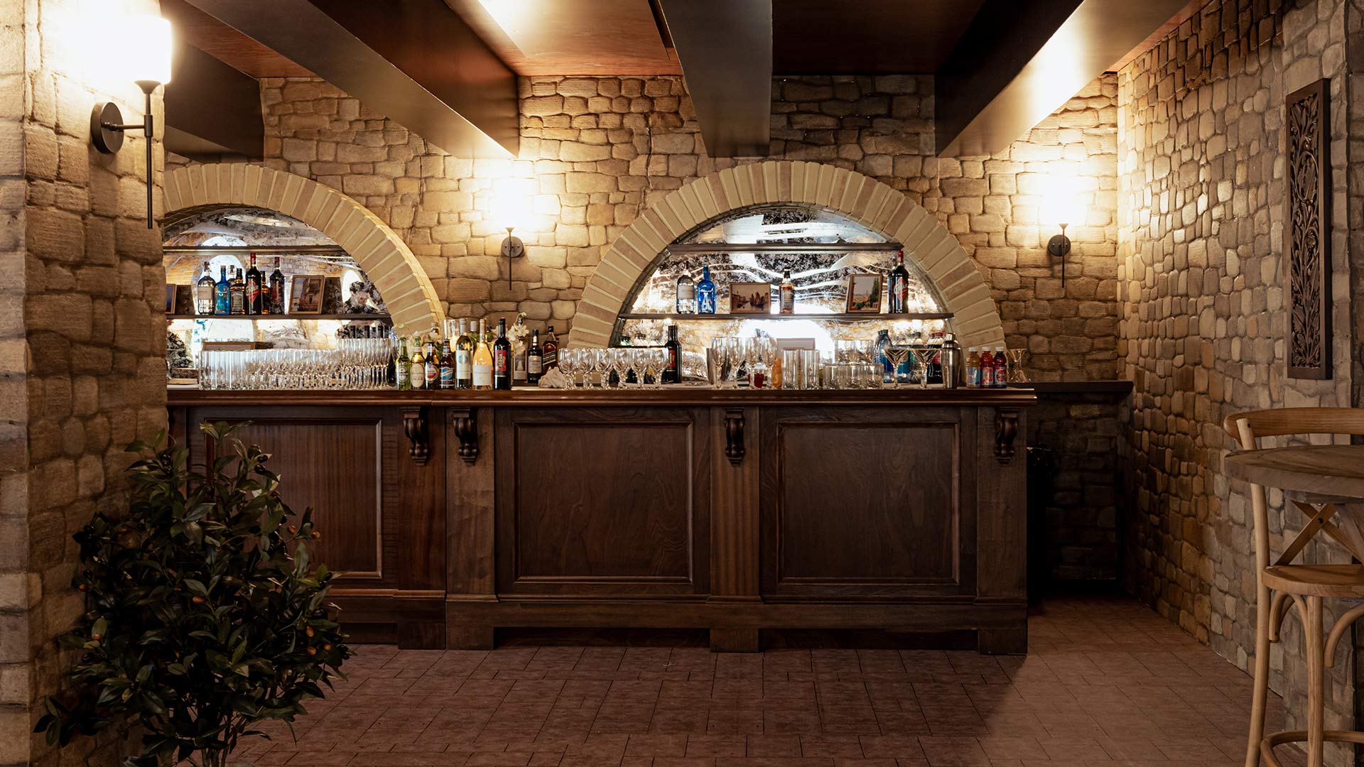 Custom arched window scenic fabrication and stone wall detail, Miller Theatre Tuscan villa by EventPro