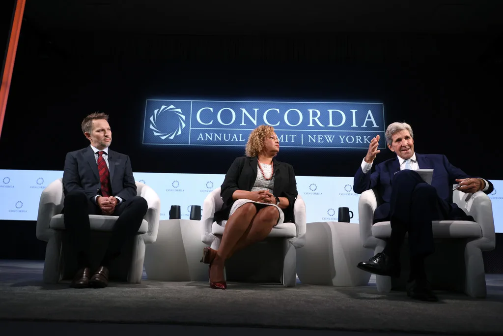 Three-panelist session at Concordia Annual Summit 2021, Concordia Annual Summit New York LED wall, white armchair seating, EventPro stage and scenic environment Sheraton Times Square
