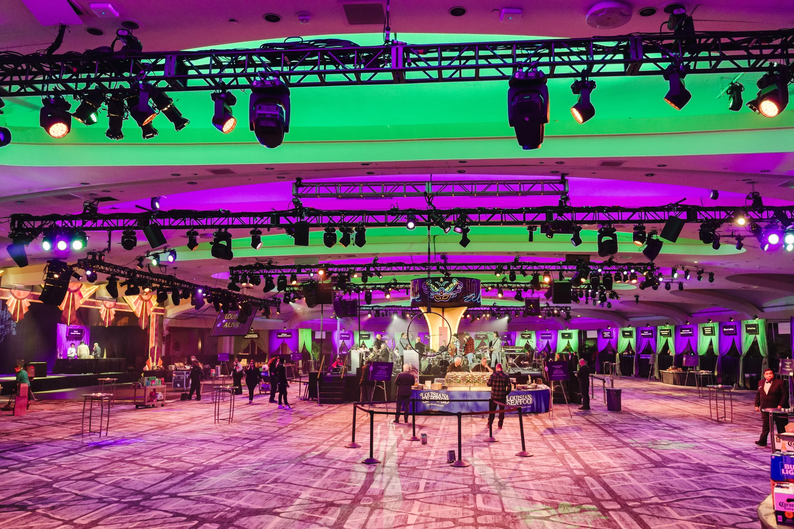 Cordish Holiday Party with full truss lighting rig in green and purple ballroom — EventPro