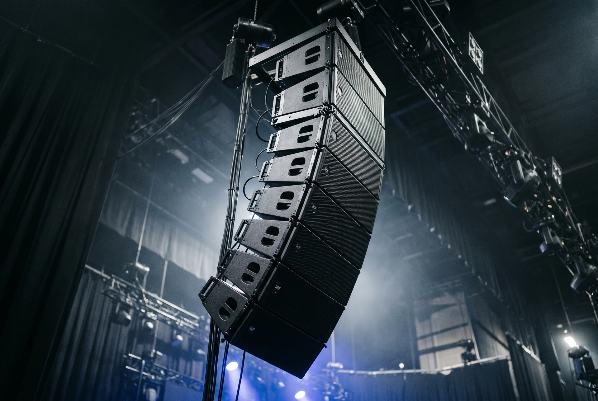 Line array speaker systems at large concert event by Event Pro