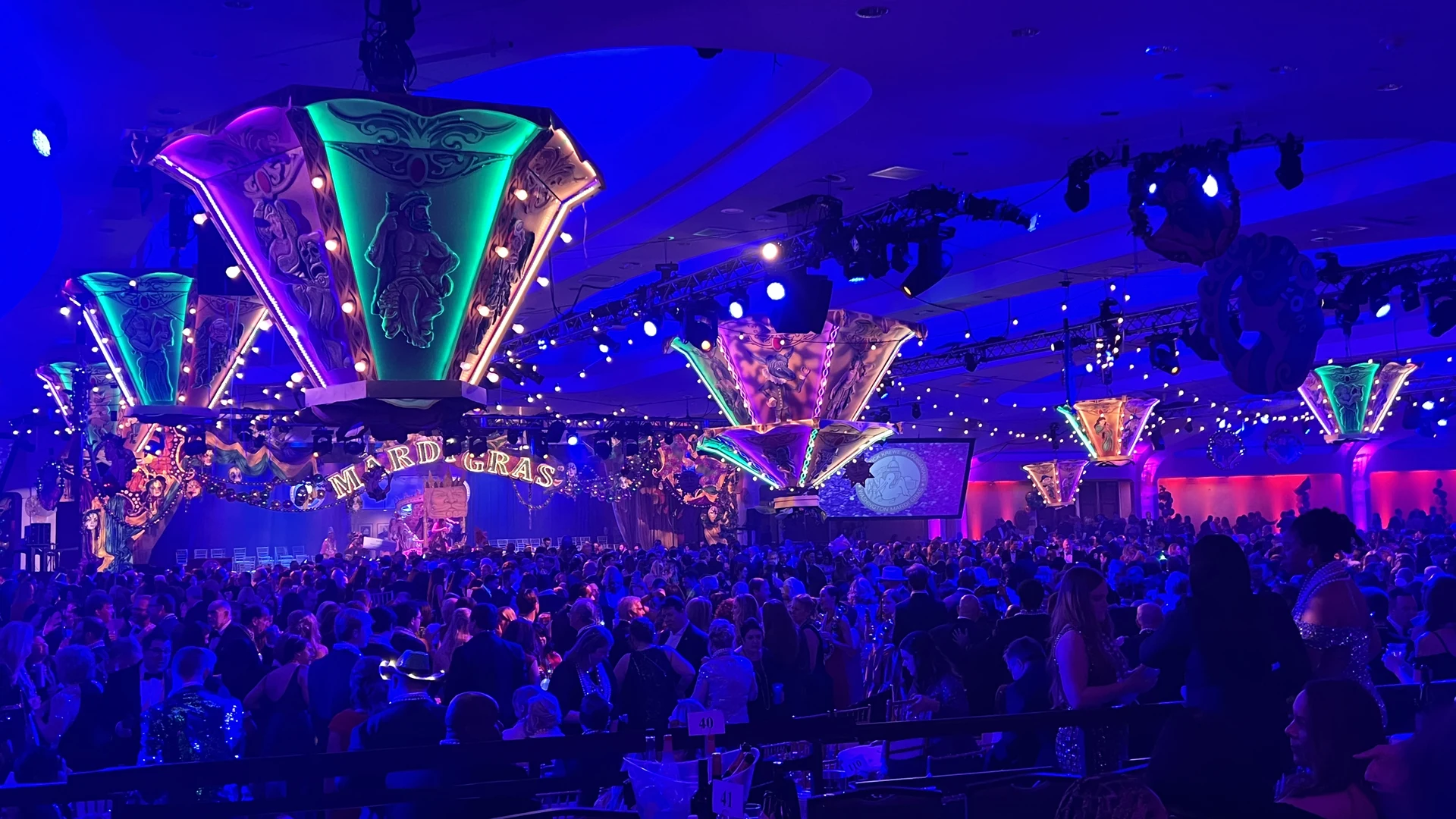 Suspended aerial decor elements rigged from ceiling at a large gala event