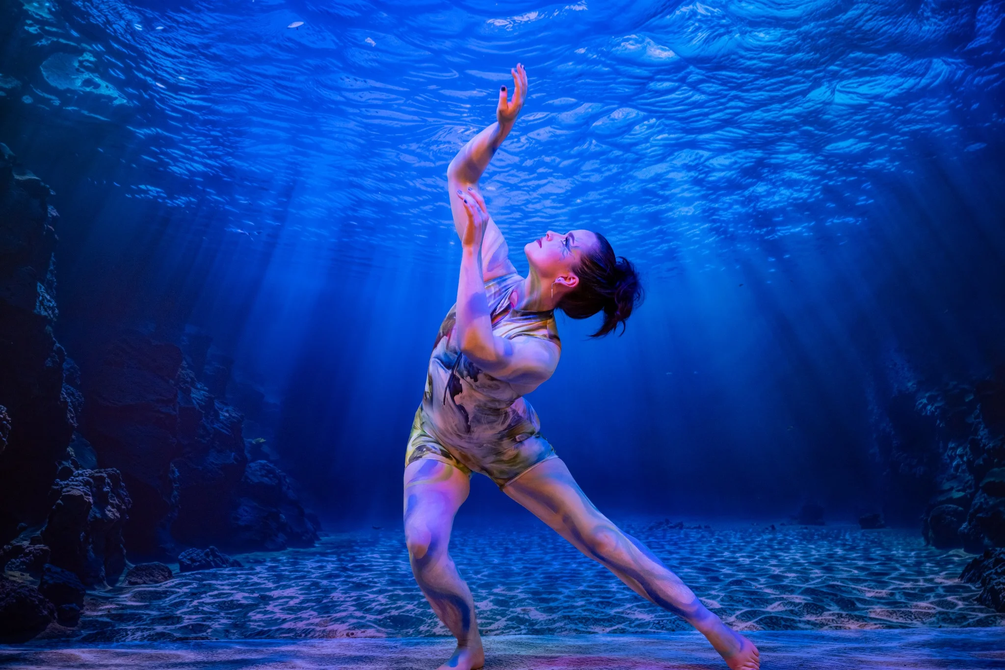 Immersive underwater projection environment with dancer — EventPro theatrical event production