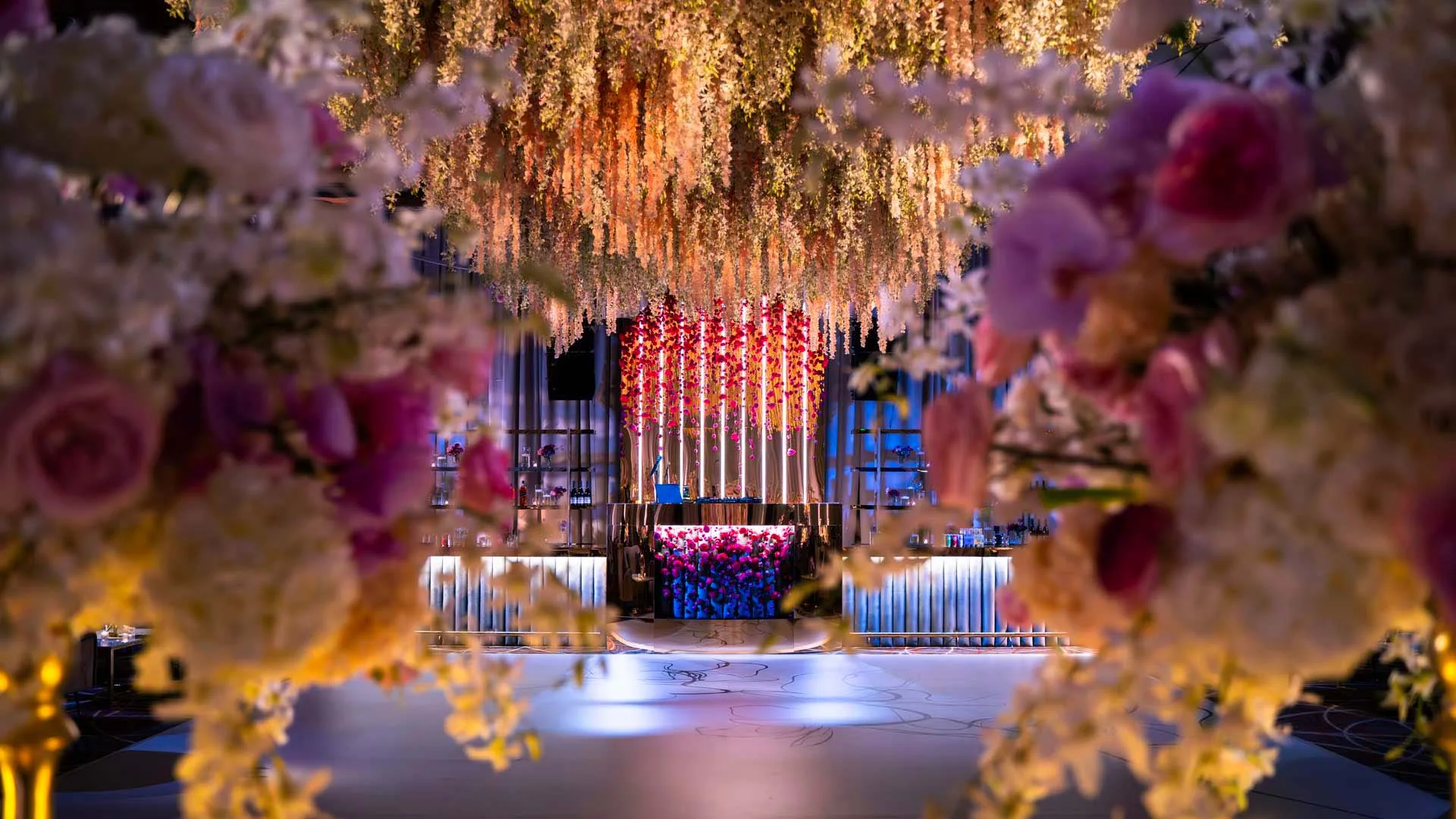 Kam and Kay wedding reception Four Seasons Baltimore floral ceiling rigging custom bar EventPro production 2023