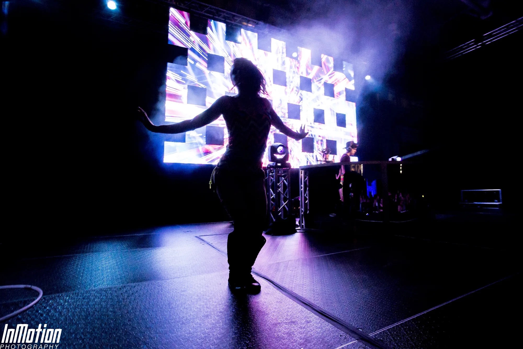 Dancer silhouette against LED video wall, Lights Out concert APGFCU Arena Maryland, EventPro lighting production