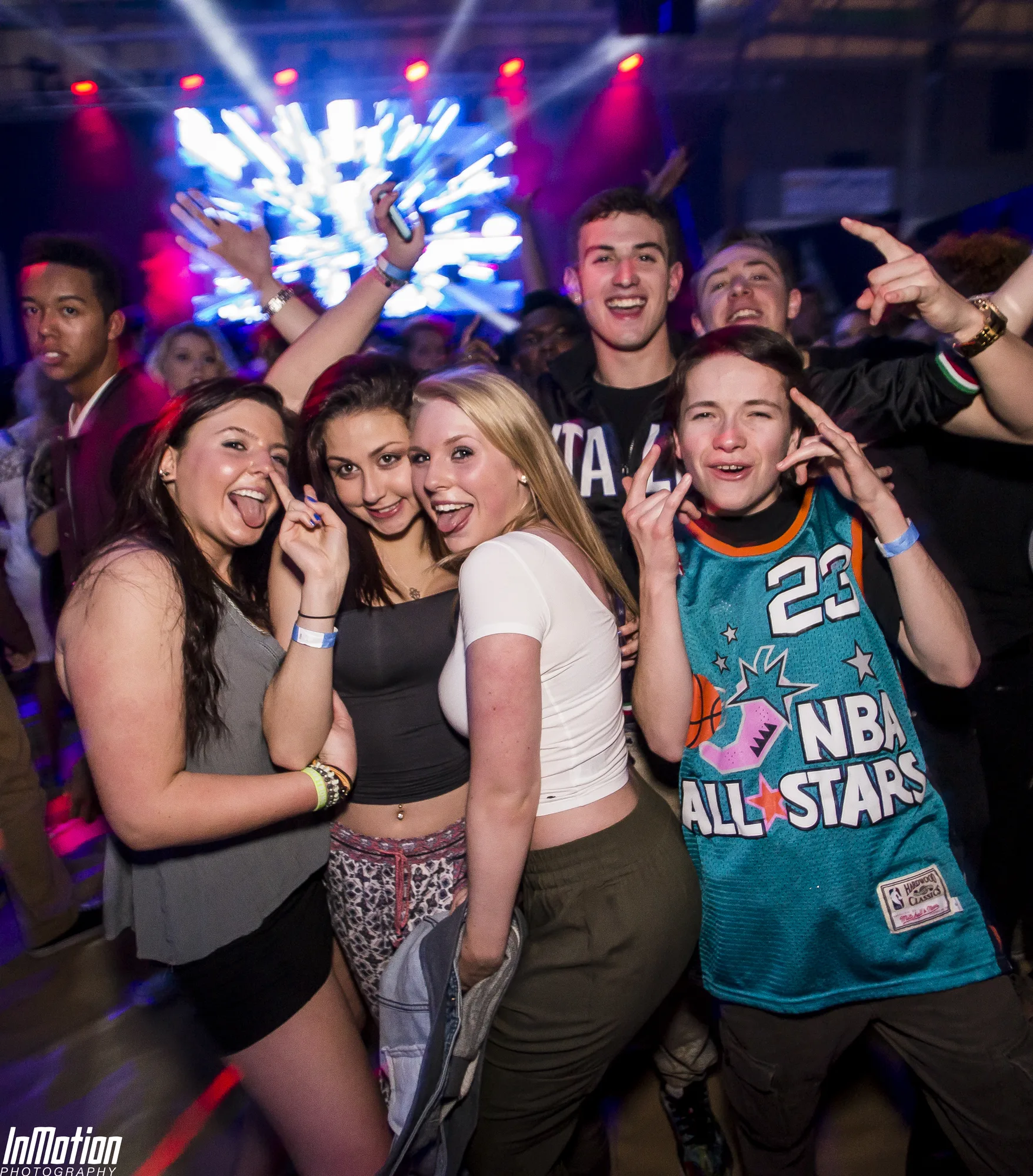 Excited crowd group at the barricade, LED video wall glowing behind, Lights Out concert APGFCU Arena Maryland, EventPro concert production