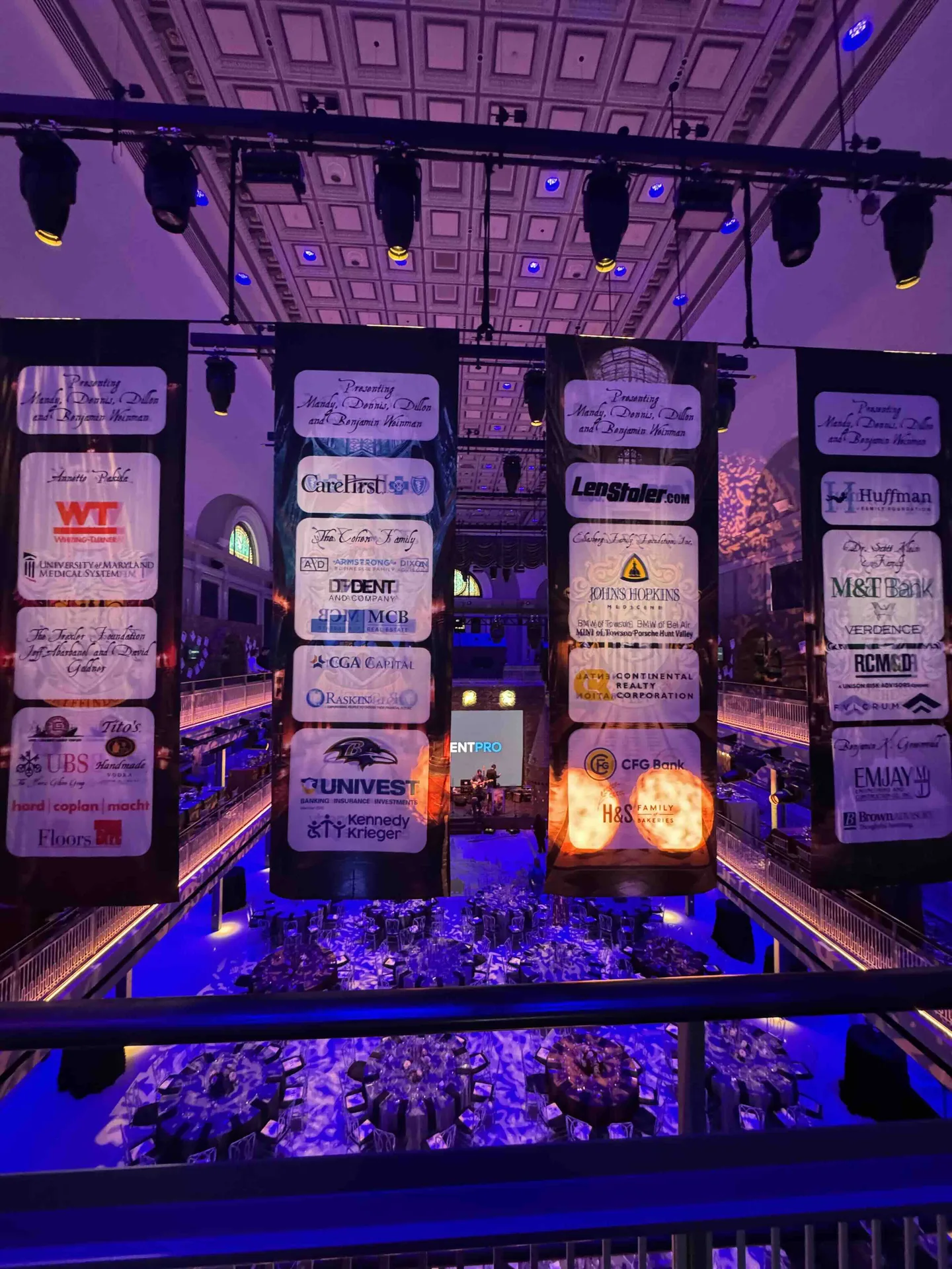 Castle stage arch and flanking sponsor tower banners suspended from the ceiling, full event identity display, Mt. Washington Pediatric Hospital Storybook Gala, EventPro graphics Baltimore