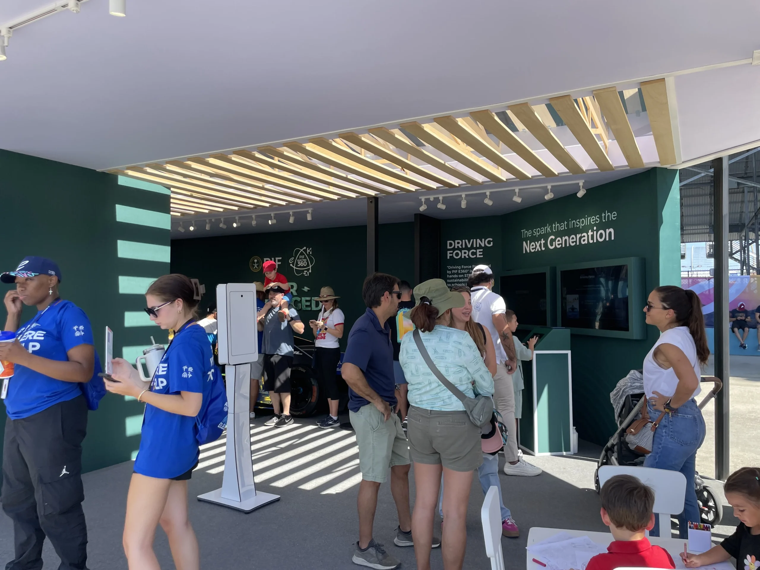 Visitors in PIF Super Charged open air activation space, Miami Formula ePrix 2025, EventPro production