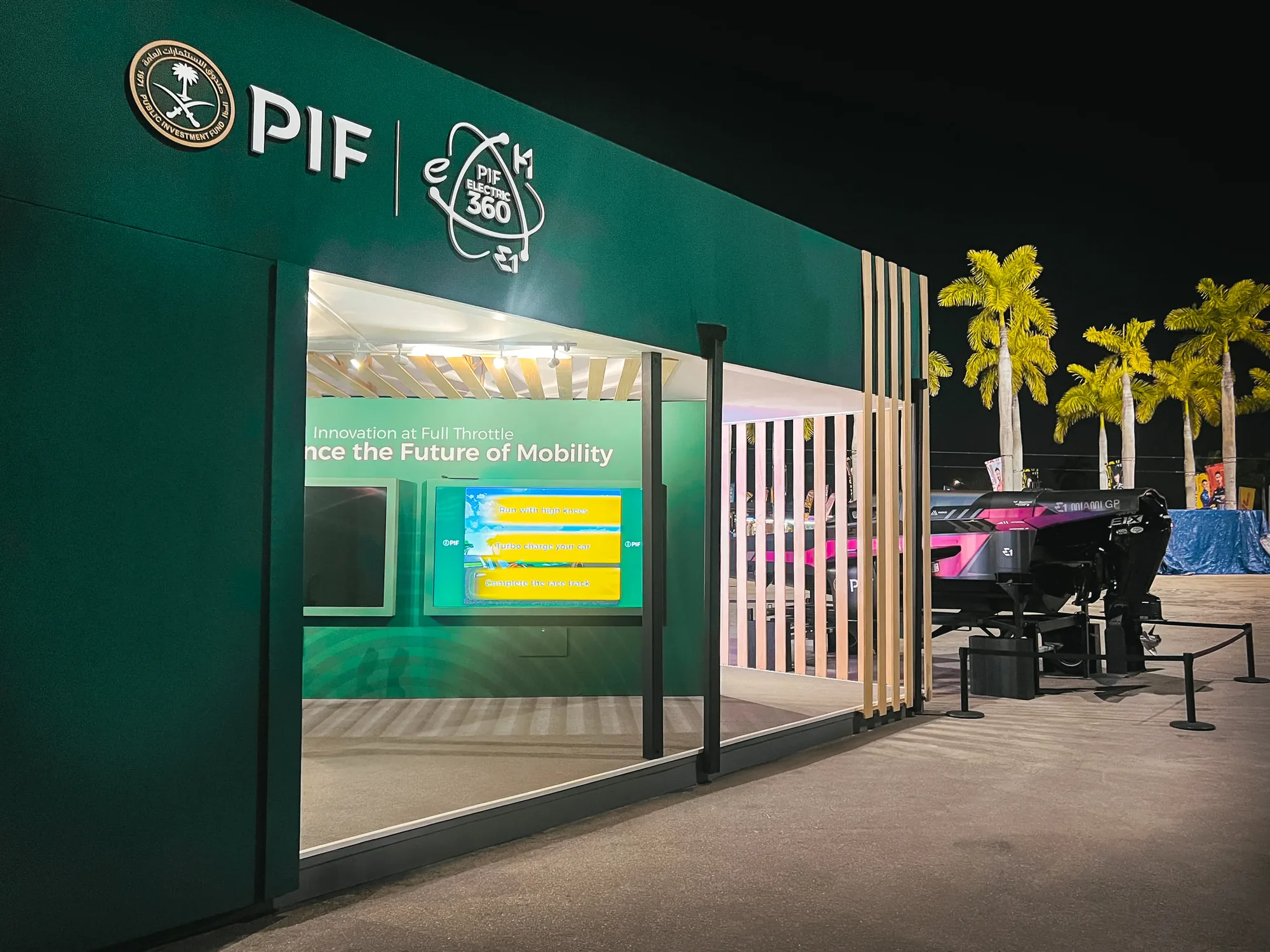 PIF Super Charged pavilion glass front facade at night, Miami Formula ePrix 2025, EventPro production