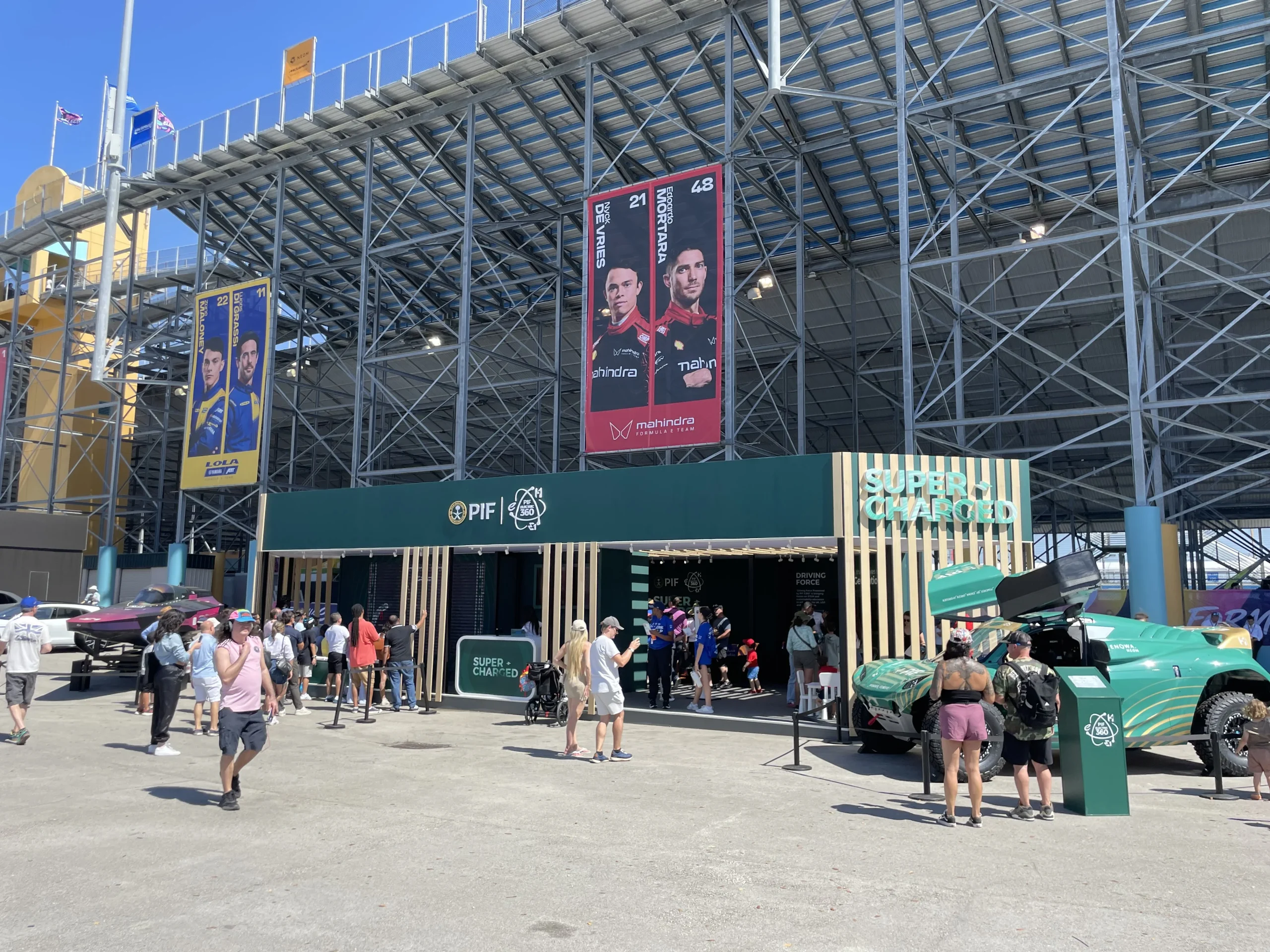 PIF Super Charged pavilion exterior in full venue context with crowds, Miami Formula ePrix 2025, EventPro production