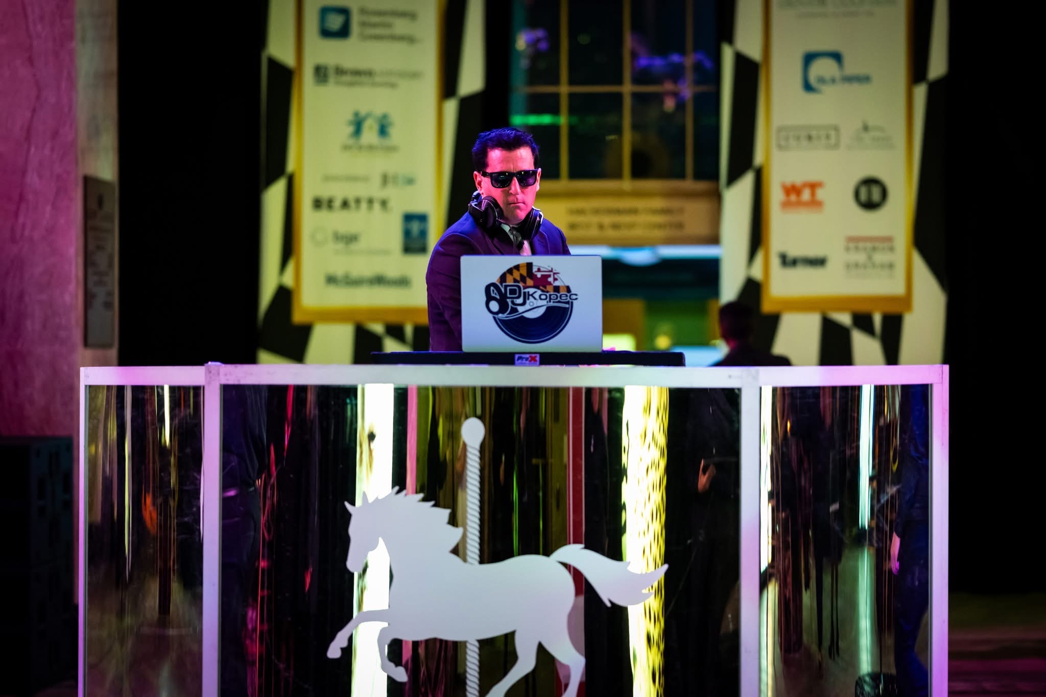 Custom-fabricated DJ booth featuring a carousel horse, scenic production detail by EventPro for the Pratt Contemporaries Black and White Party Baltimore