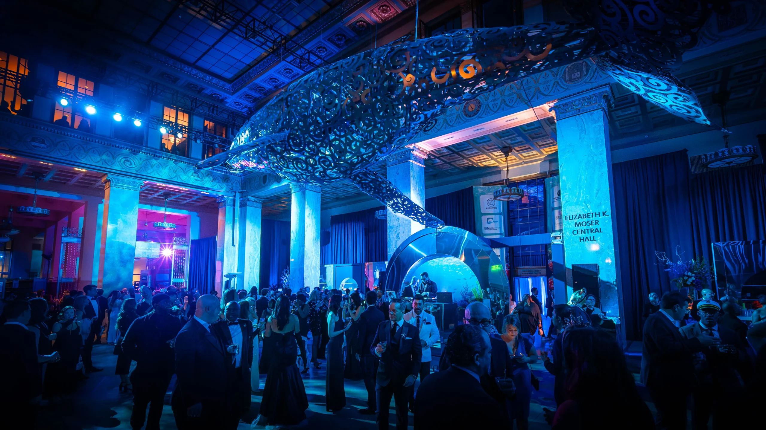 Gala with monumental steel whale sculpture and blue lighting — Enoch Pratt Free Library — EventPro