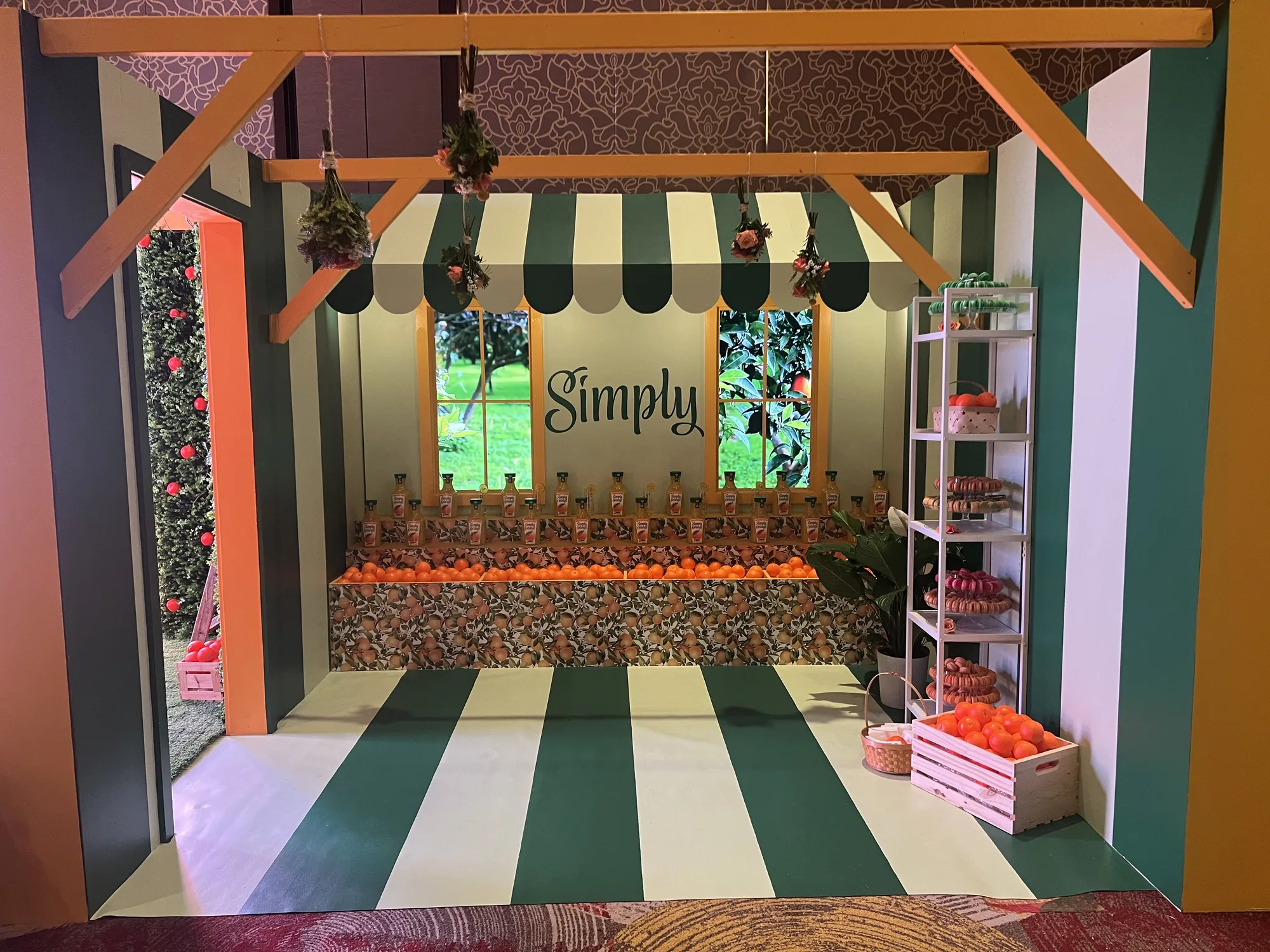 Simply market stall exterior with green striped awning and branded product counter, Hard Rock Hotel Miami Gardens brand activation 2024, EventPro