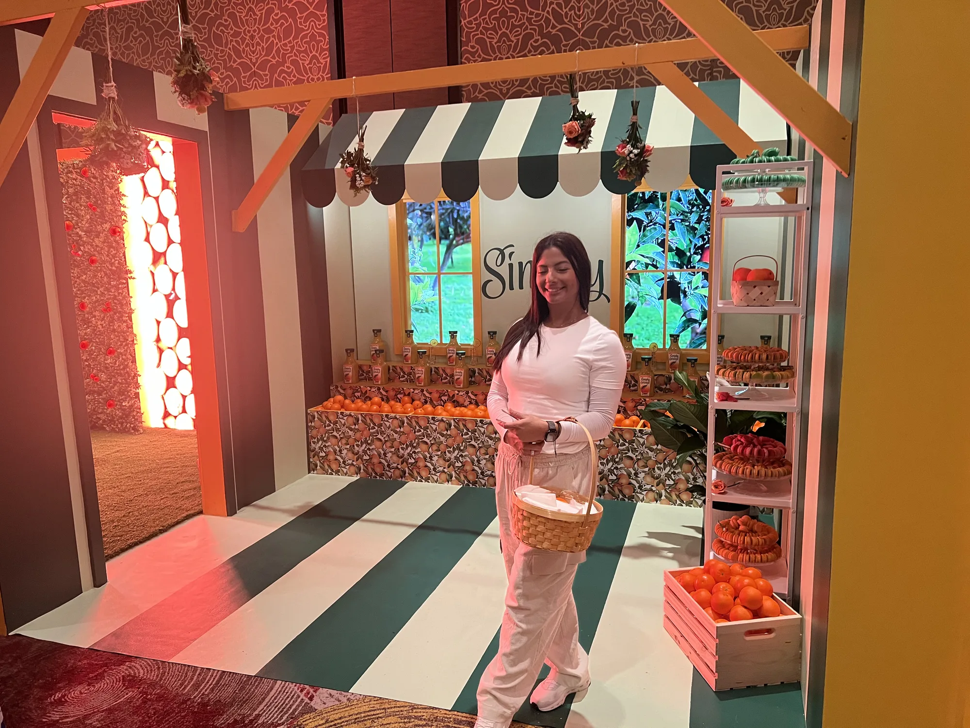 Guest in the Simply market stall carrying a branded basket, Hard Rock Hotel Miami Gardens brand activation 2024, EventPro
